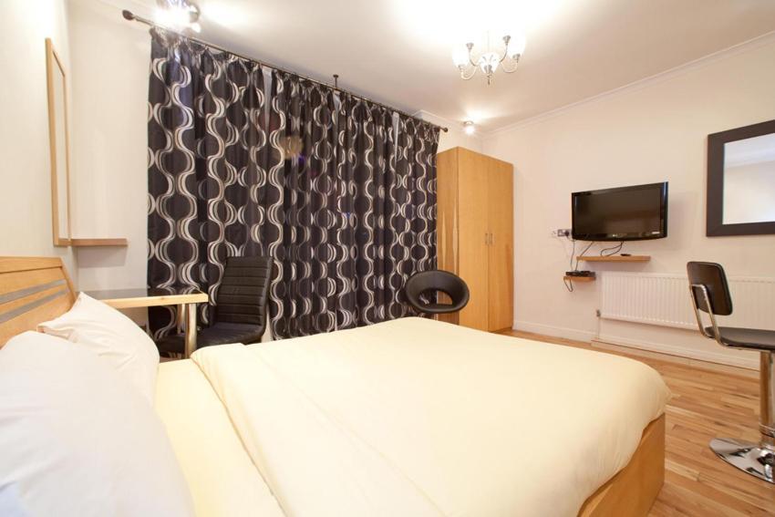 Milestone Apartments Лондон Стая снимка